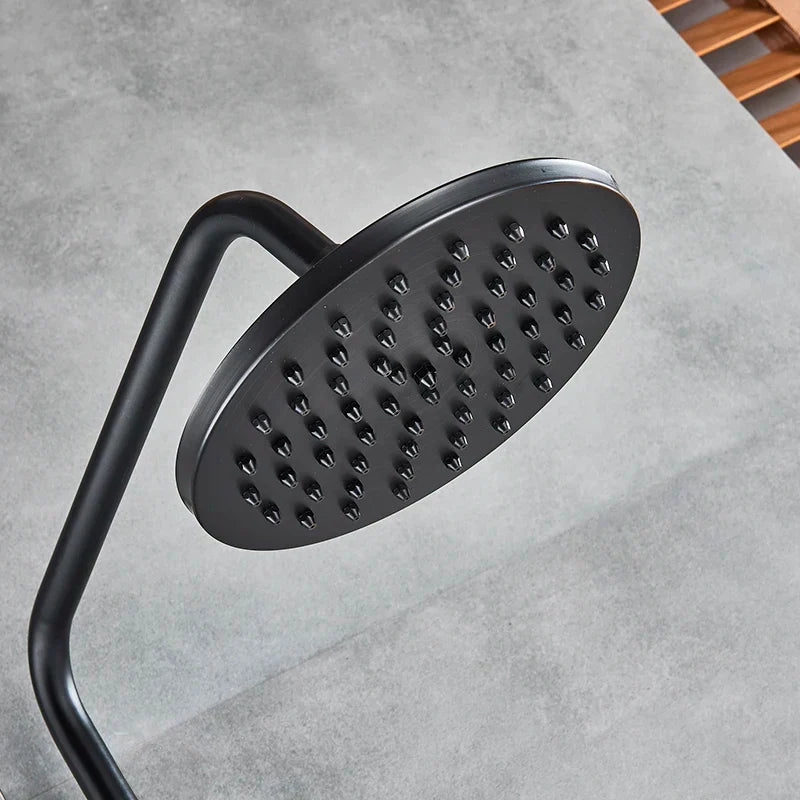 Juego de grifería para ducha DecorBites™ en bronce negro con cabezal de ducha tipo lluvia de 8" y ducha de mano.