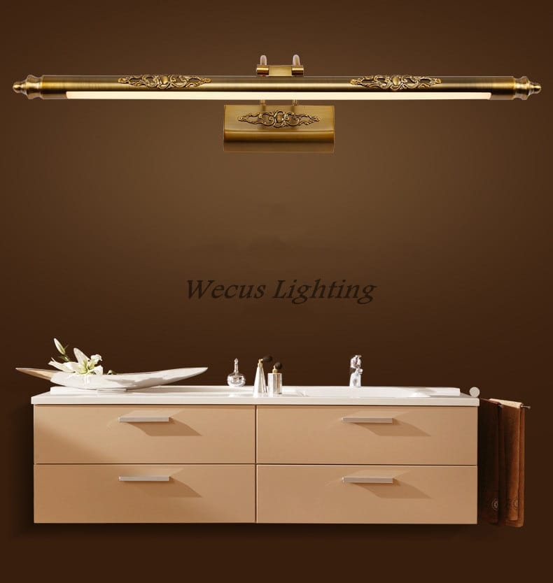 Antique bronze ornate LED mirror lamp with gold-toned floral detailing and sleek modern design for bathroom wall decor.