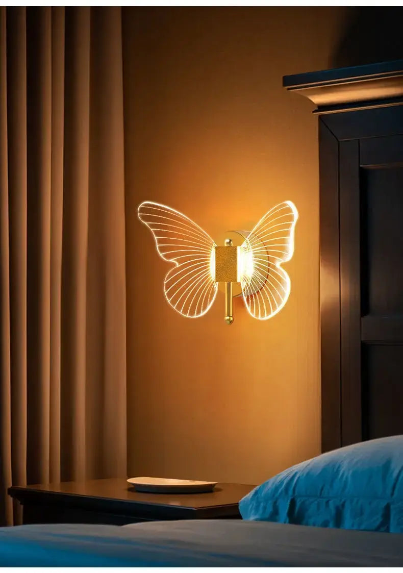 modern nordic gold led butterfly wall lamp featuring a gold-toned copper led butterfly design with illuminated translucent wings casting a warm glow, ideal as a bedroom wall lamp.