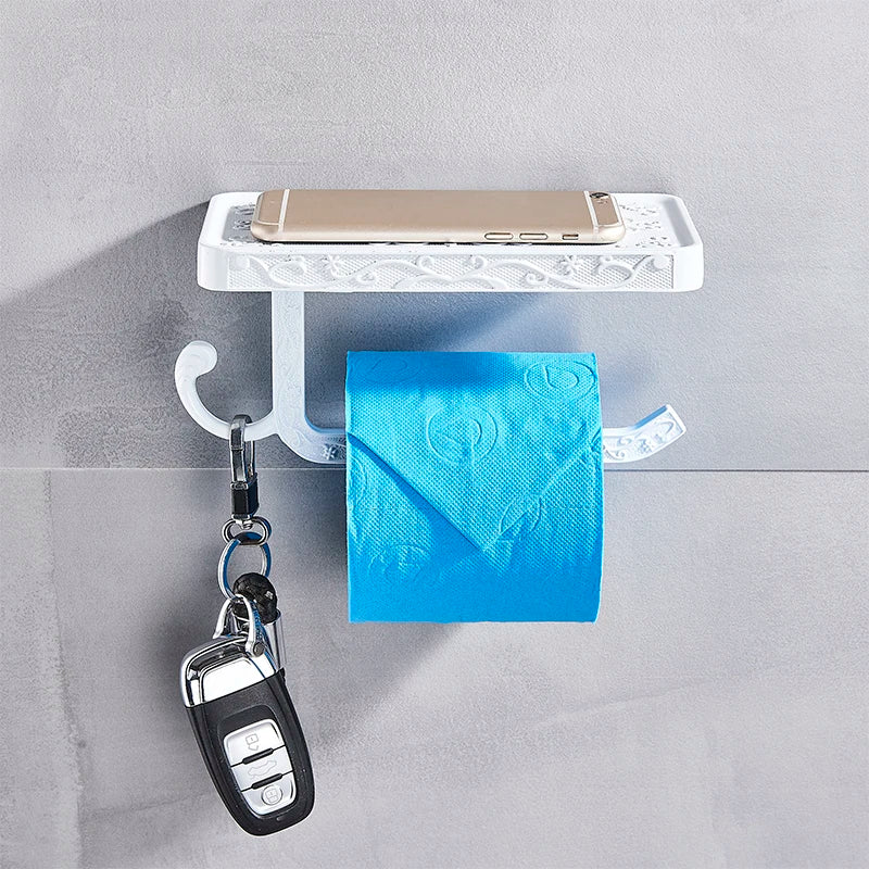 حامل ورق تواليت أسود مع رف للهاتف من DecorBites™: وحدة تخزين حائطية من الألومنيوم للحمام
