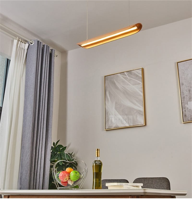 modern brushed gold kitchen island light fixture featuring a sleek rectangular gold-finished pendant with a minimalist design perfect for chandeliers kitchen island and kitchen island light applications.