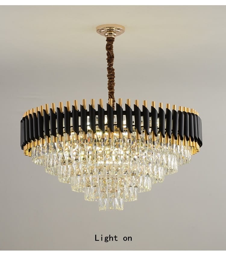 A luxury k9 crystal tiered chandelier featuring a gold-toned ceiling mount, black and gold vertical bars forming the upper ring, and cascading clear crystal prisms ideal for dining room lighting.
