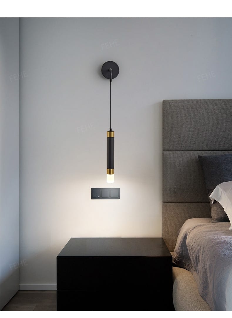 Black cylindrical pendant wall lamp with gold accents designed for minimalist creative luxury bedroom and luxury bedroom bedside use.