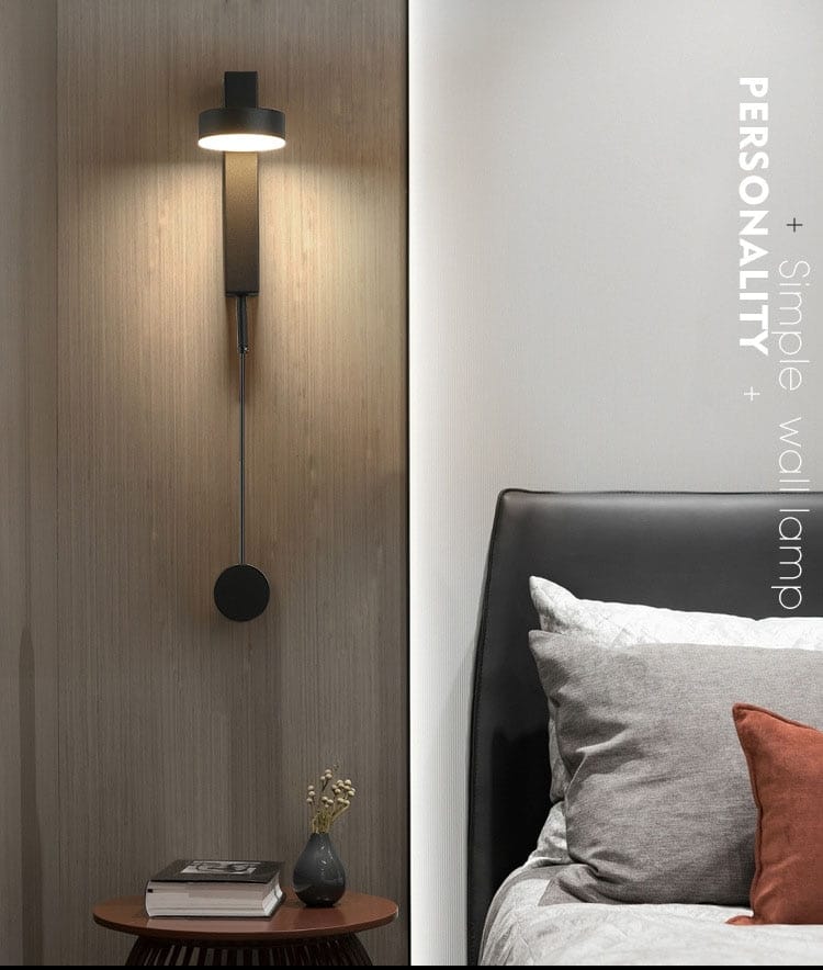 Black minimalist modern led wall lamp with sleek rotating sconce design and warm light for bedroom use.