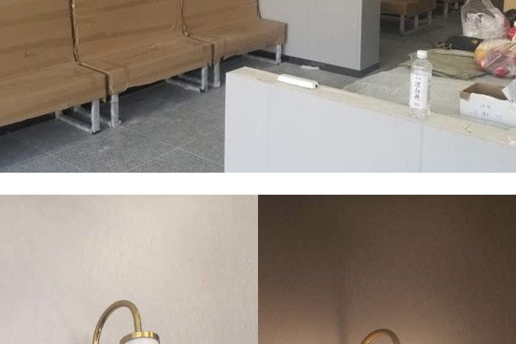 gold-colored modern minimalist led wall lamp with a curved arm and frosted glass cylindrical shade mounted on the wall suitable for bedroom use.