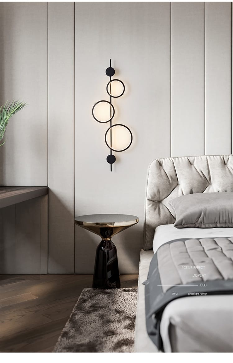 modern black circular led wall sconce with a sleek minimalist design featuring nordic linear long style suited for living room lighting.