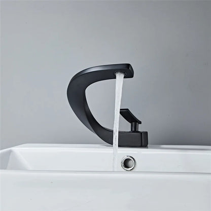 Grifo mezclador para lavabo DecorBites™ negro, acabado dorado cepillado, para baño, agua fría y caliente, cromado.