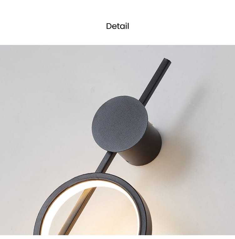 Modern black linear long led wall light featuring a sleek cylindrical mounting base and a circular illuminated ring ideal for living room sconce lighting.