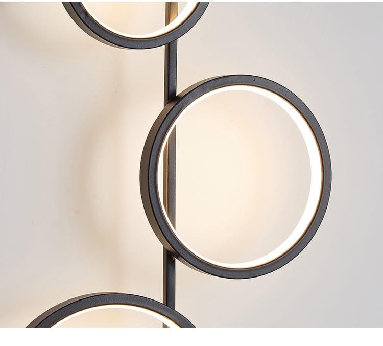 modern black circular pendant light with illuminated rings designed as a nordic linear long led living room sconce wall light.