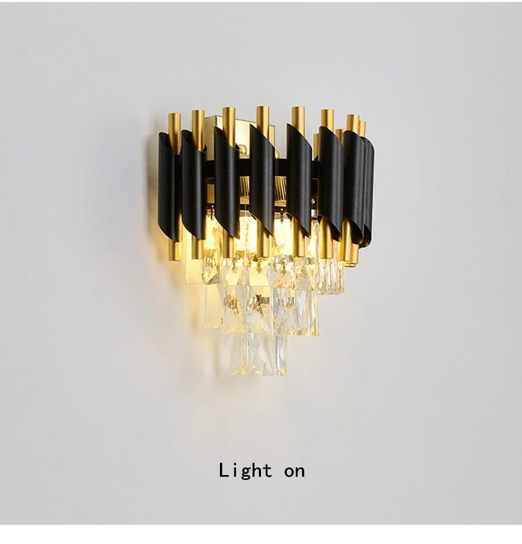 Luxury k9 crystal tiered chandelier wall sconce in gold and black with cascading crystal accents for dining room lighting by Nebra luxury crystal chandeliers.