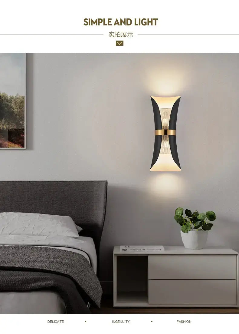 Modern black and gold curved wall lamp featuring a sleek design ideal for bedroom lighting.
