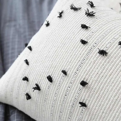 Funda de cojín DecorBites™ con borlas geométricas para sofá cama