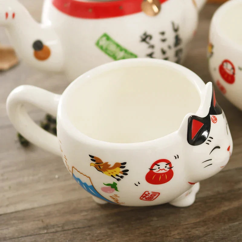 DecorBites™ Lucky Cat Porcelain Tea Set: Maneki Neko Tea Cup Pot, Strainer, Plutus Cat Teapot Mug