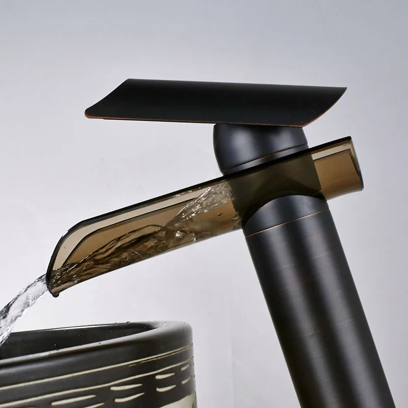 Grifo mezclador de lavabo tipo cascada con caño de cristal en bronce negro DecorBites™ - Grifo de encimera para montaje sobre cubierta