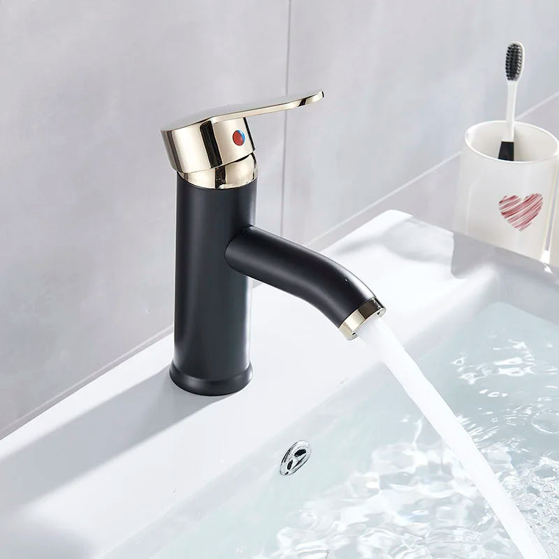 Grifo monomando DecorBites™ negro y dorado para lavabo de encimera