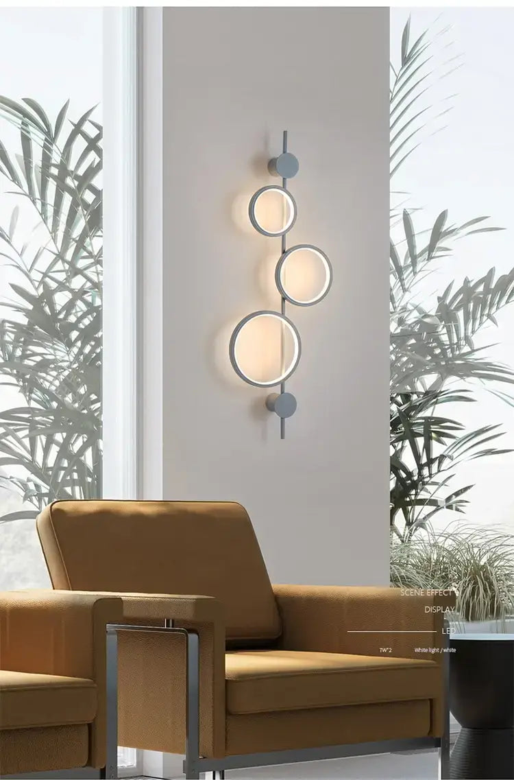 Modern black linear long led wall light living room sconce featuring a sleek metal frame with three circular frosted glass shades in a nordic linear long design.