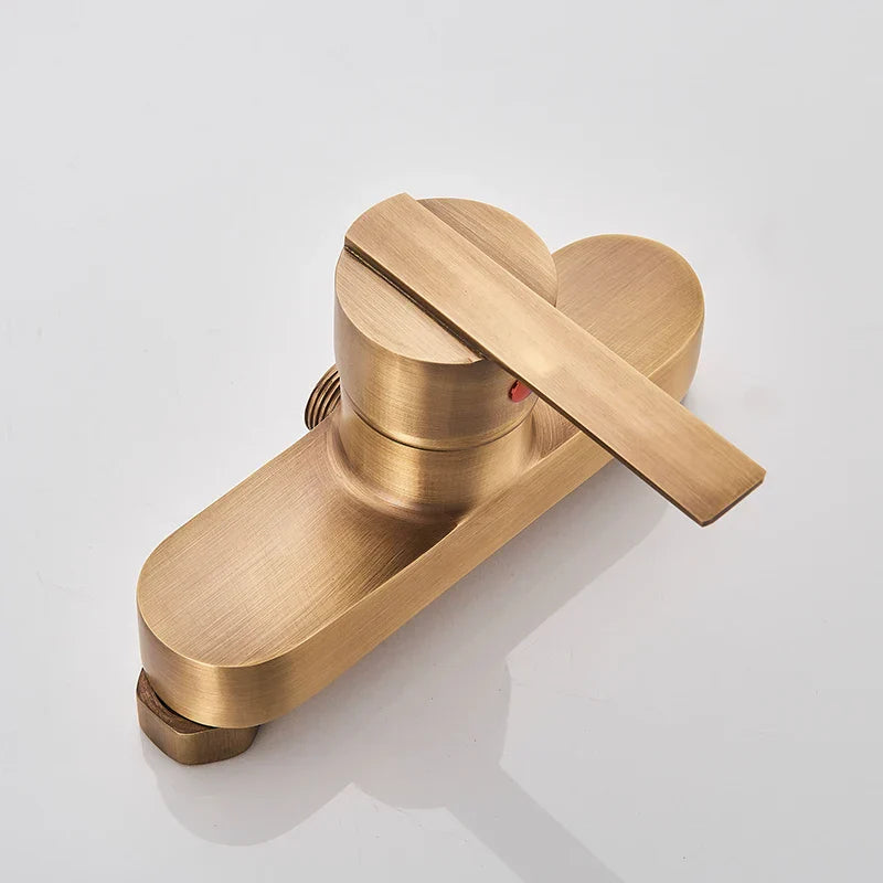 Juego de ducha DecorBites™ de latón antiguo con monomando y grifo mezclador de pared tipo lluvia.