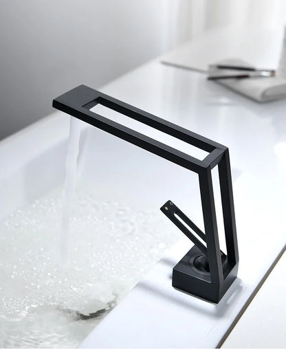 Grifo mezclador para lavabo DecorBites™ de latón negro con monomando para montaje en cubierta