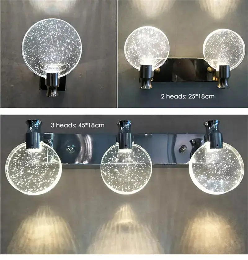 Modern gold crystal led wall lamp featuring three clear glass globe heads with a sparkling starry design and black metallic bases as a simple crystal led bathroom vanity light fixture.