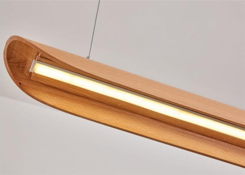 modern brushed gold kitchen island light fixture chandelier featuring a warm curved design with wood chandeliers kitchen and integrated led strip for efficient kitchen island light.