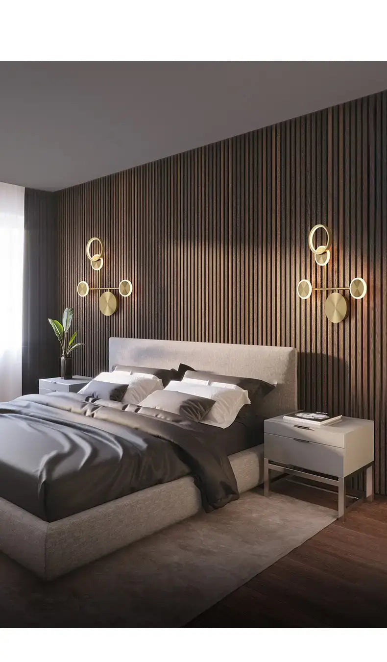 Modern golden geometric led wall lamp with gold-toned circular design and sleek minimalist style for living room wall lamp lighting.