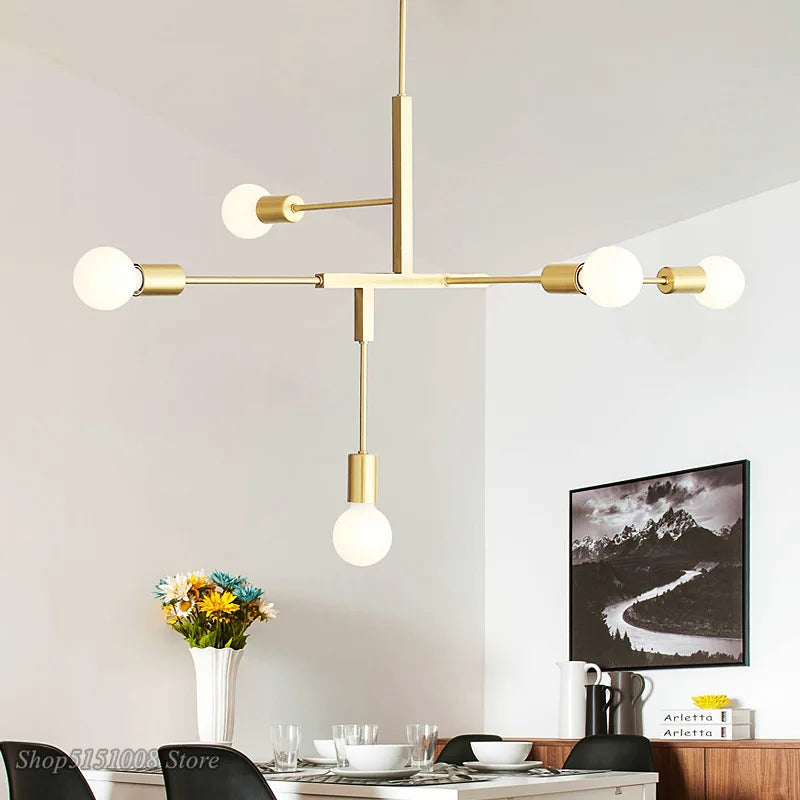 Lámpara colgante DecorBites™ estilo cruz de 5 luces en acabado dorado y negro para decoración moderna del hogar.