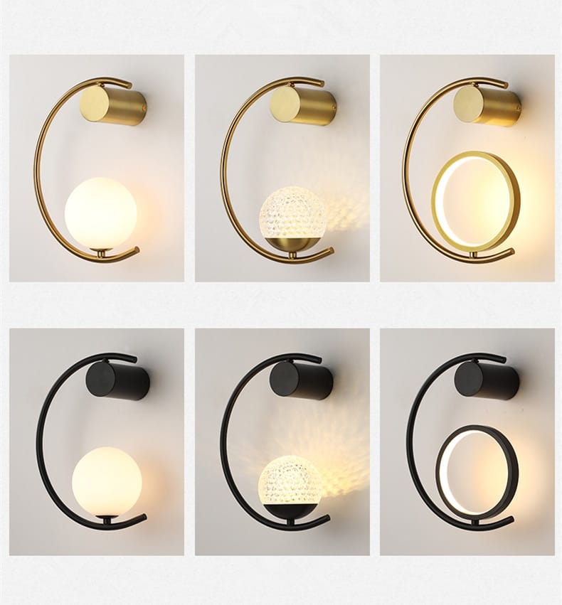 Modern gold luxury creative led bedside wall lamp featuring a curved metallic frame and a spherical illuminated glass shade in a gold finish for bedroom use.