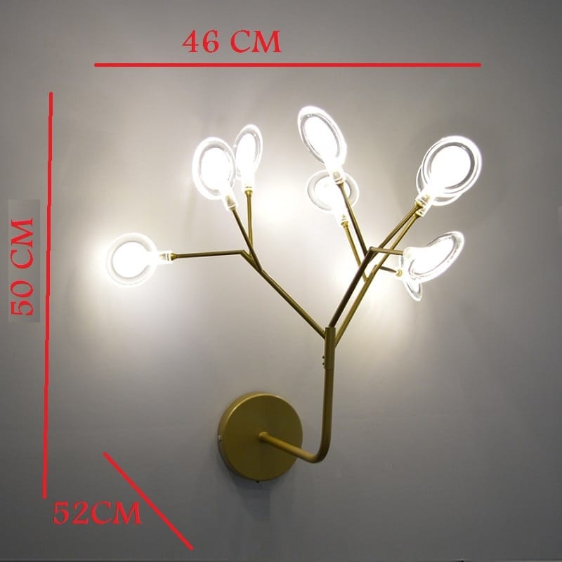 modern gold firefly tree branch led wall light featuring a gold-toned branching design with multiple clear oval-shaped led light fixtures ideal for bedroom use.