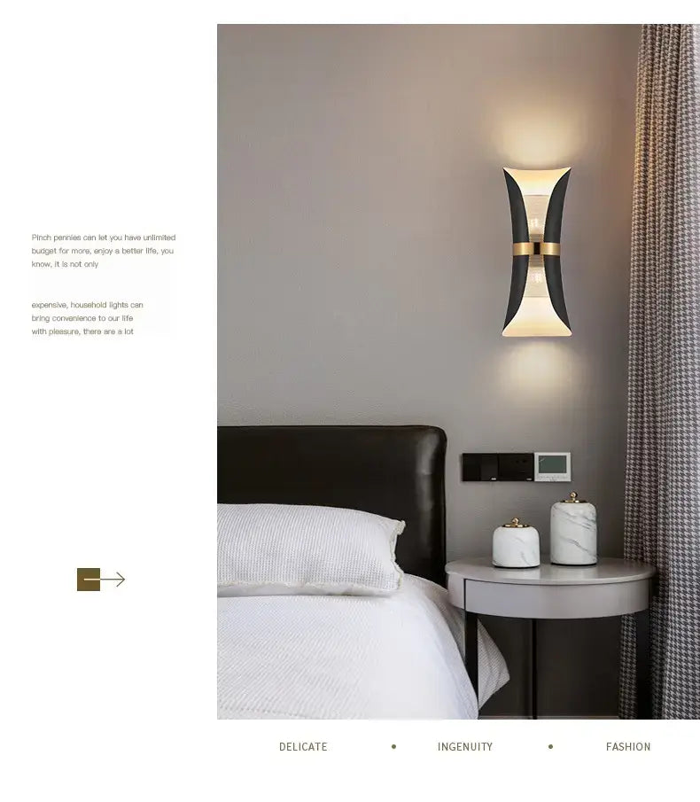 Modern black and gold curved wall lamp with sleek design and metal accents ideal for bedroom lighting.