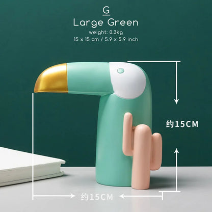 DecorBites™ Bird Figurine: Modern Resin Toucan Statue for Home Office Decor & Phone Holder