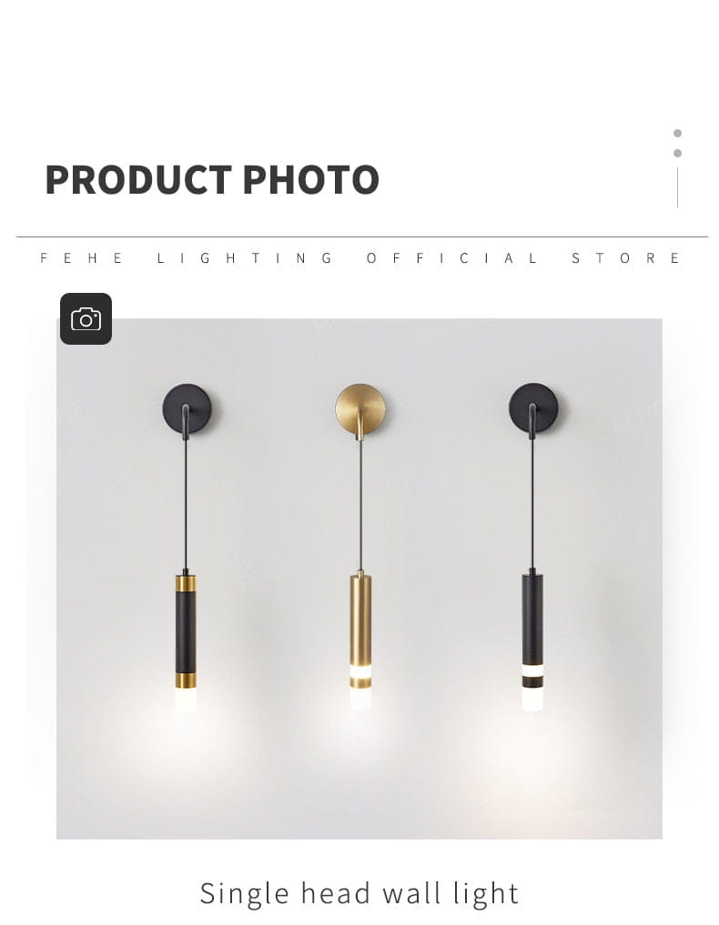 Three minimalist creative luxury black and gold bedside wall lamps with sleek cylindrical design and thin cord suspension for luxury bedroom bedside lighting.