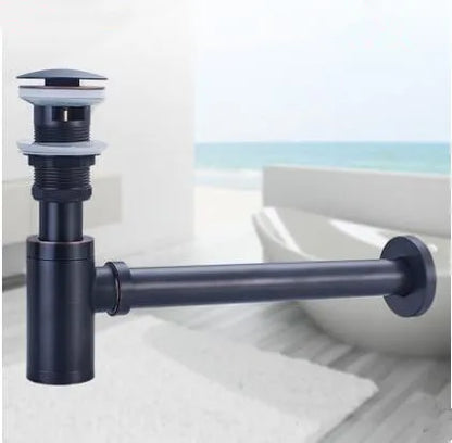 مجموعة تصريف المياه المنبثقة من DecorBites™ المصنوعة من النحاس العتيق مع أنبوب P-Trap لحوض الحمام.