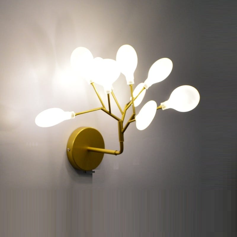 Modern gold firefly tree branch led wall light features a gold-toned wall light with a branching design and multiple frosted glass bulb fixtures, ideal as an elegant led wall light for bedrooms.