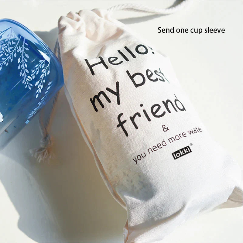 زجاجة مياه زجاجية زرقاء من ديكوربايتس™ سعة 600 مل بتصميم ختم دب قطبي لطيف