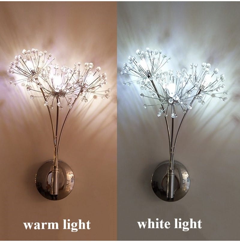 Silver dandelion-style nordic creative crystal flower wall lamp with crystal accents and a sleek chrome metallic base for bedroom use.