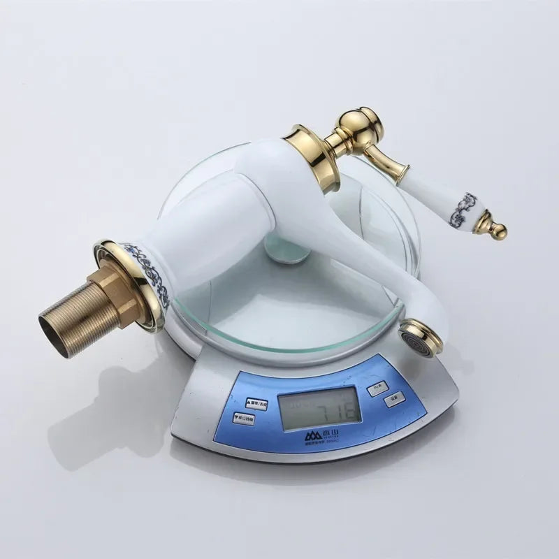 DecorBites™ High Quality White Ceramic Basin Faucet with Golden Finish