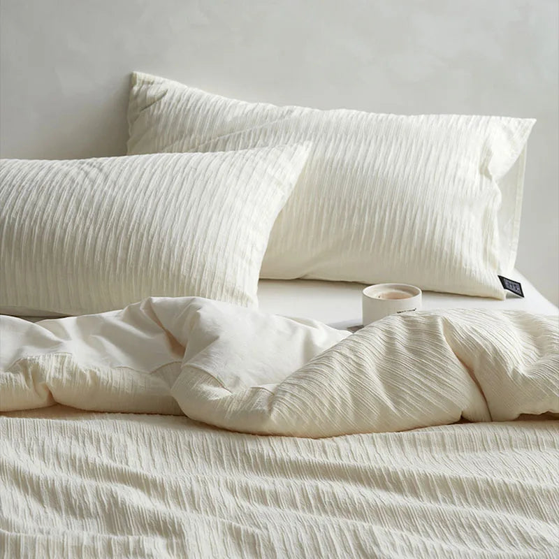 طقم أغطية سرير DecorBites™ مصنوع من خيوط إسفنجية قطنية 100% بتصميم جاكار بلون واحد