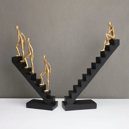 DecorBites™ Escultura abstracta de hombre dorado escalando escaleras Adornos para el hogar