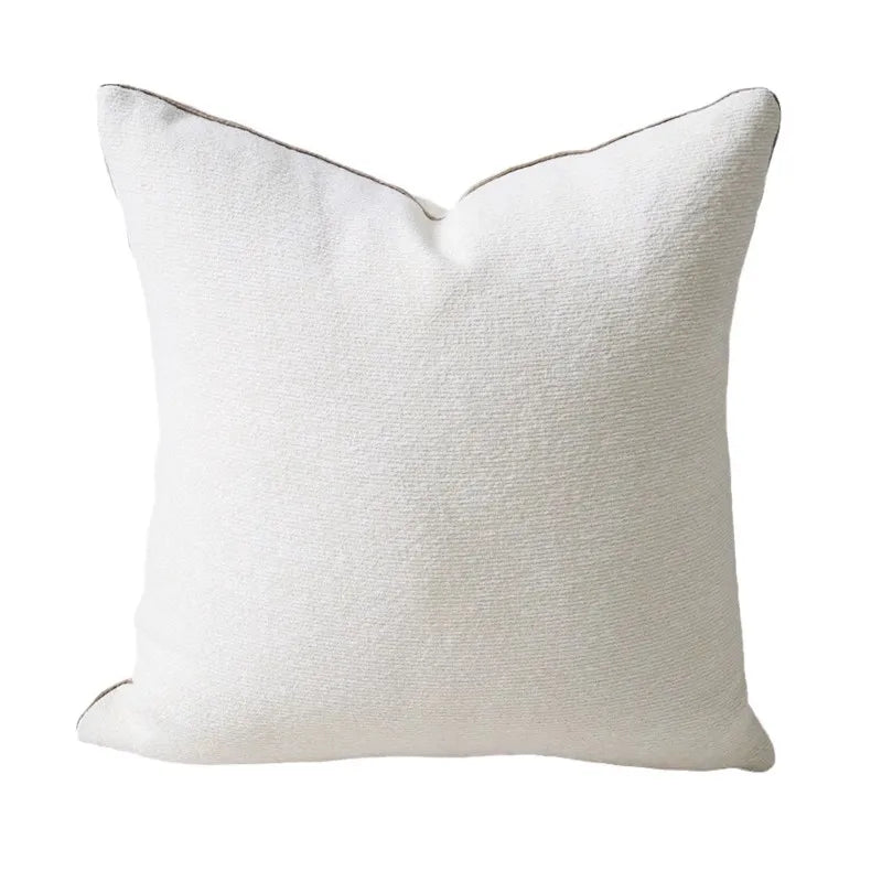 Funda de almohada DecorBites™ con diseño geométrico de anillos convexos en jacquard color capuchino.