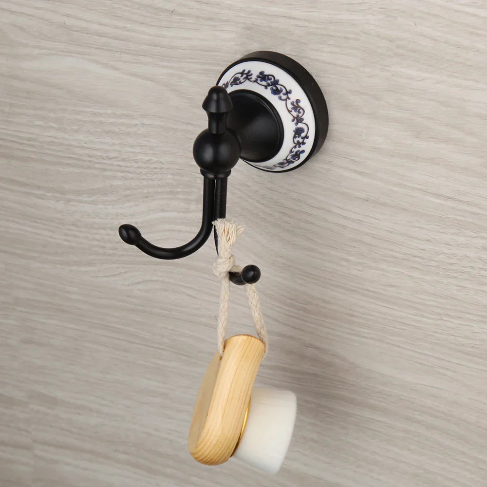 خطاف منشفة حمام مثبت على الحائط من DecorBites™ مصنوع من الفولاذ المقاوم للصدأ باللون الأسود وشماعة رداء ومعطف