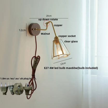 Aplique de pared DecorBites™ de cristal cobrizo con luz LED ámbar giratoria para espejo de baño moderno