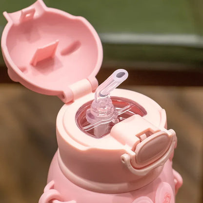 DecorBites™ Kids Cute Cartoon Water Cup with Portable Strap - BPA-Free Student Sippy Cup