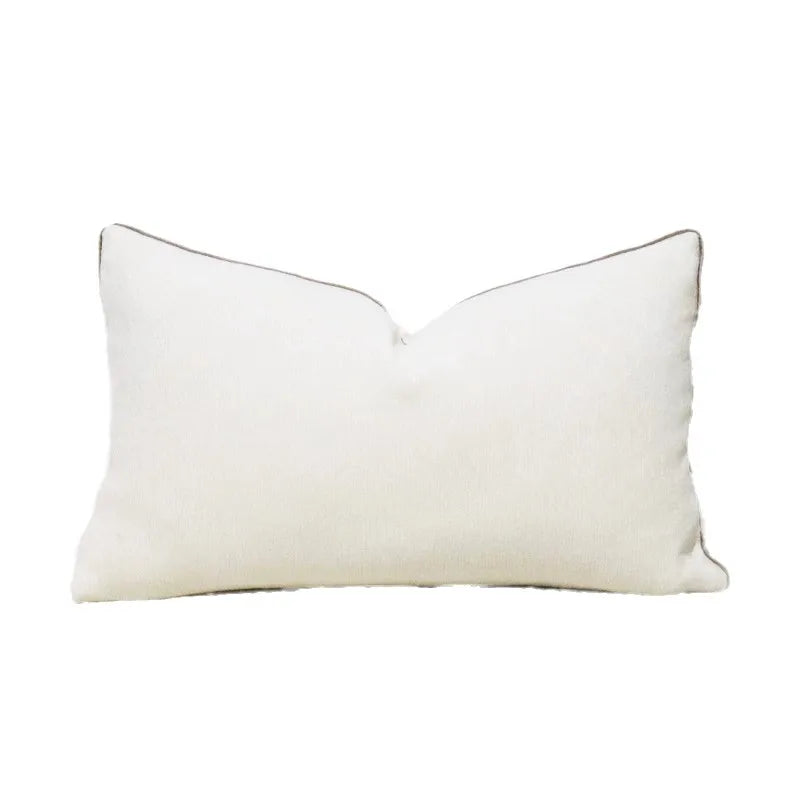 Funda de almohada DecorBites™ con diseño geométrico de anillos convexos en jacquard color capuchino.