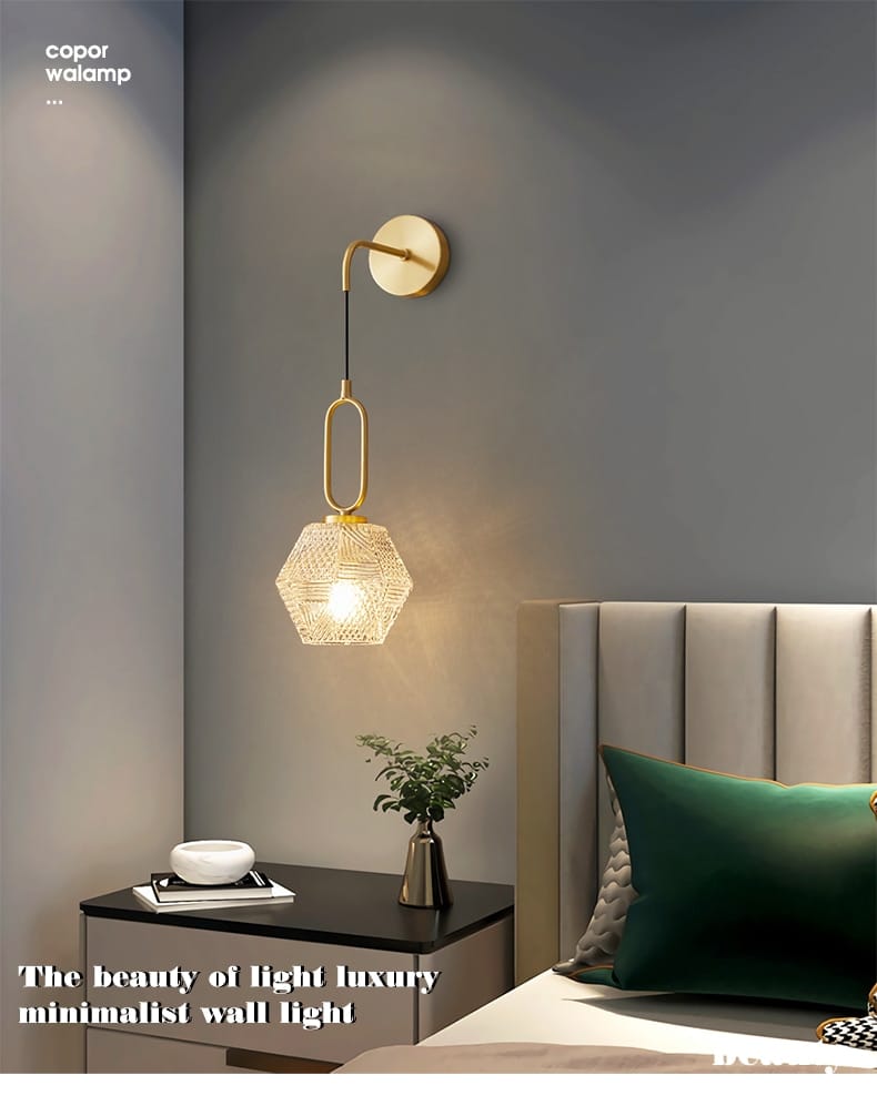 Gold-toned postmodern luxury led wall lamp featuring a geometric pendant design with a woven glass shade suitable for bedroom lighting.