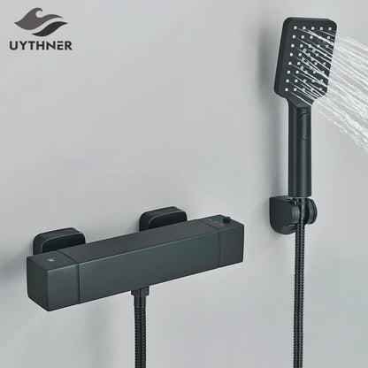 طقم دش ترموستاتي DecorBites™ أسود/كروم مع خلاط مثبت على الحائط من النحاس مع بخاخ