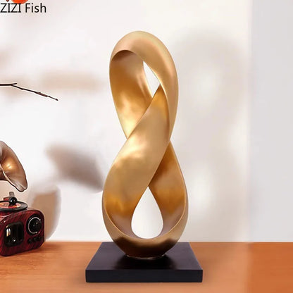 Adorno de escritorio DecorBites™ con escultura de nudo dorado. Decoración minimalista y abstracta para habitaciones.