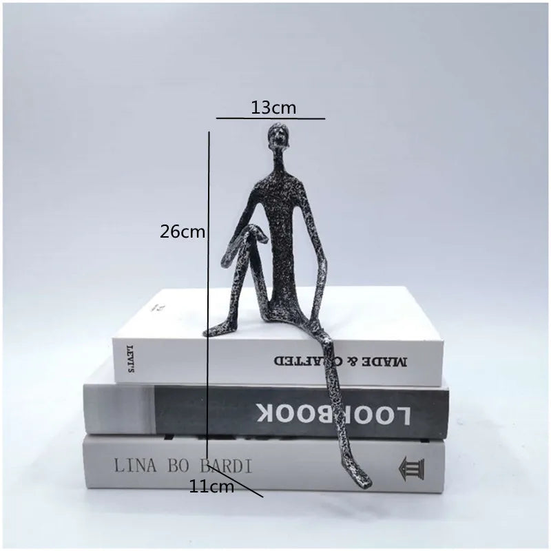 ديكوربايتس™ - منحوتة معدنية تجريدية لشخص أسود من الحديد الزهر لتزيين سطح المكتب