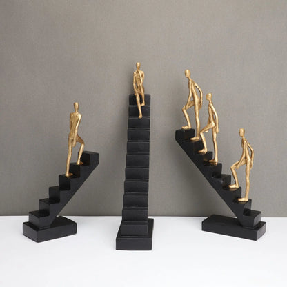DecorBites™ Escultura abstracta de hombre dorado escalando escaleras Adornos para el hogar