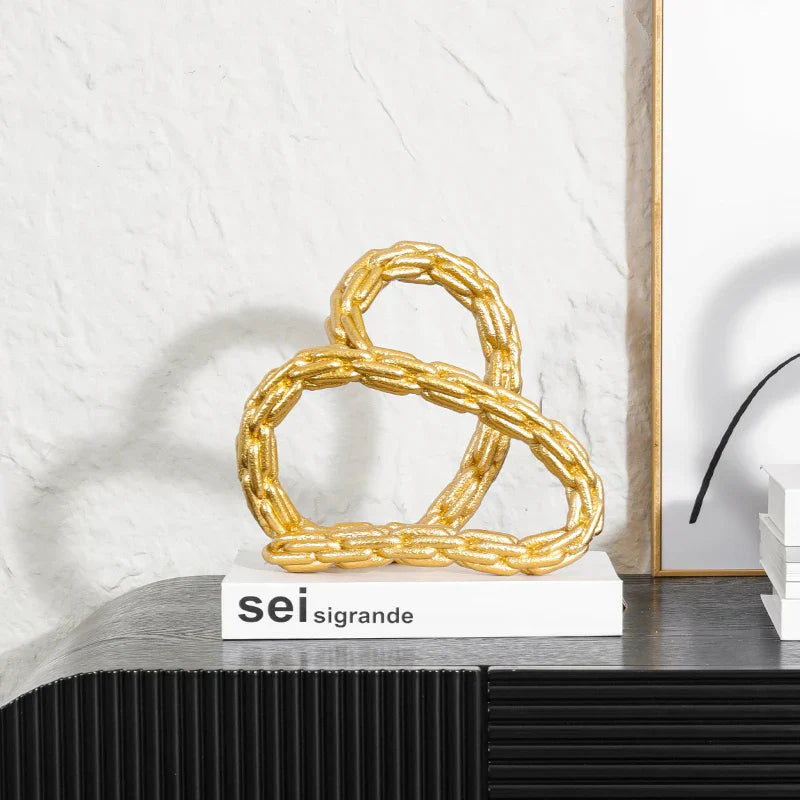 DecorBites™ Golden Knot Chain Ring Geometric Decorative Figurine - Resin Home Decor Accessory