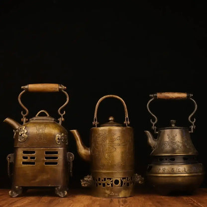 مجموعة ديكوربايتس™ العتيقة: مواقد الفحم، وأباريق النبيذ الدافئة، وأباريق الشاي النحاسية، وديكورات المنزل